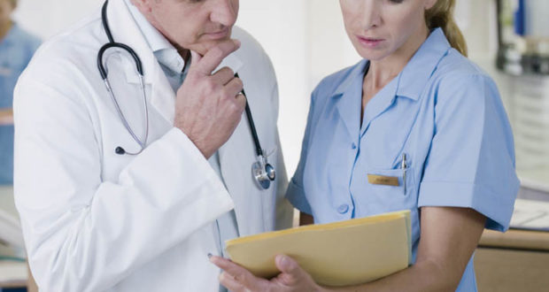 Doctor-and-nurse-with-medical-ch