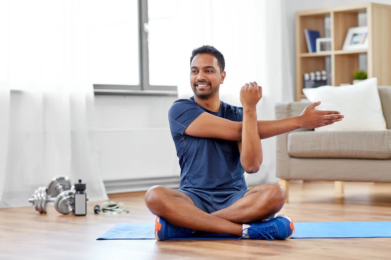 Man-stretching-before-working-ou